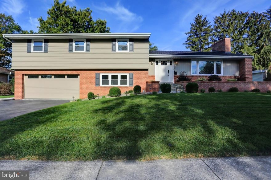 LOCATION, LOCATION, LOCATION and TOTALY remodeled!  This sprawling home is conveniently located in the Borough of Chambersburg.  Easy walking distance to schools and shopping.   Multiple levels offer space for everyone.  Primary bedroom with en suite bath and stunning tile shower.  3 additional spacious bedrooms and beautiful NEW full bath complete with upper level.  Main floor has laminate hardwood flooring and great natural light.  Kitchen showcases quartz countertops, stainless appliances, laundry closet which could be converted into a pantry and a breakfast bar.  Kitchen exits to a composite deck, lower patio and fully fenced backyard.  From the main level living room the stairs lead to a family room with wood burning fireplace and an immaculately kept 2 car garage.  Basement is partially finished with a rec room and large storage/ utility room.  Current sellers have replaced all cosmetics features, flooring, furnace, A/C, garage doors, water heater, windows, doors, added 6ft fence and the list goes on.