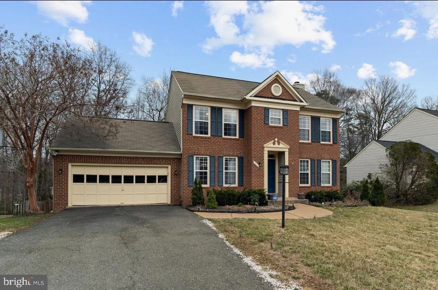 This stunning brick-front colonial offers over 1,800 square feet of beautifully finished living space across three levels. Situated on a peaceful cul-de-sac and backing to mature trees, the home combines classic charm with modern upgrades in a spacious, traditional layout perfect for comfortable living and entertaining.
Gourmet eat-in kitchen with modern appliances and ample table space. Bright, expansive recreation room with walk-out access to the backyard, Elegant primary suite with a tiled bath and generous closet space. Fully finished basement featuring a fifth bedroom and full bath. Two-car garage and a charming deck ideal for outdoor relaxation
Located in a highly desirable Stafford neighborhood with low HOA fees, this home offers convenient access to top-rated schools, shopping, and major commuter routes. Move-in ready and beautifully maintained. A true must-see!