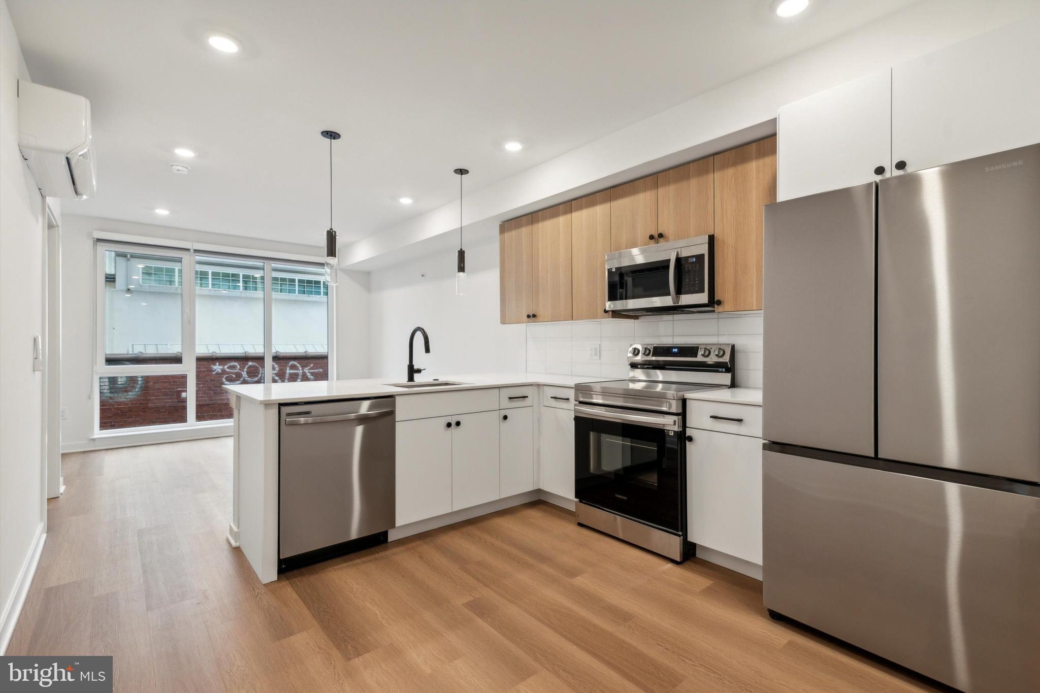 Introducing 828 N 2nd St Luxury Living in Northern Liberties!
Welcome to 828 N 2nd St, a brand-new 55-unit luxury apartment community located in the heart of Northern Liberties one of Philadelphia's most vibrant and walkable neighborhoods. This modern development features studio, one-, and two-bedroom apartments with spacious layouts, high-end finishes, and sleek, contemporary design throughout.
Residents enjoy a robust lineup of amenities, including a beautifully furnished lobby, private dog park, and a rooftop deck with panoramic skyline views, complete with outdoor kitchen grills and lounge seating. The on-site gym is equipped with Pelotons, and the resident lounge features a full kitchen perfect for hosting, relaxing, or remote work. Additional perks include secure tenant storage and more.
Exciting new ground-floor retail tenants CorePower Yoga and Madis Coffee are coming soon, adding even more convenience right at your doorstep.
Just steps from the best restaurants, bars, cafes, and shops in Northern Liberties, 828 N 2nd St offers the perfect mix of comfort, community, and city living.