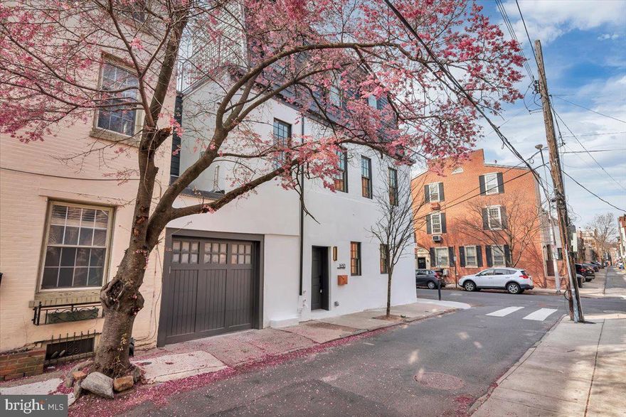 This brand new construction home located in the highly sought-after Rittenhouse Square neighborhood is an absolute stunner. The builder's attention to detail and commitment to showcasing the home's artistic angles and openness is apparent from the moment you step inside. The main level offers an expansive living area that seamlessly flows into the dining room and kitchen. The kitchen features stainless steel appliances, including a double oven, and is beautifully accented with quartz countertops and hardwood floors throughout. The attached garage offers easy access directly off the main living area. As you make your way up to the second level, you'll find two generously sized bedrooms and a full bathroom adorned with exquisite tile finishes. The third level is dedicated to the owner's suite, which boasts a luxurious bathroom and access to a private rooftop deck with breathtaking city views. This home offers a rare opportunity to live in a new construction home in the heart of Rittenhouse Square with the added convenience of an attached garage. Taxes and square footage are to be verified by the buyer.