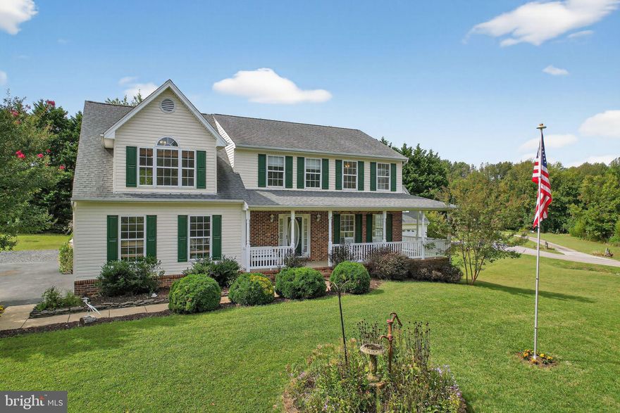 WELCOME TO THIS MOVE-IN READY HOME WITH A 28’x26’ DETACHED CONDITIONED GARAGE/WORKSHOP IN HUNTINGTOWN.  $2,500 LENDER CREDIT WHEN USING SELLER'S PREFERRED LENDER + FREE APPRAISAL! This well cared for home is situated on an acre, flat homesite in the community of Trotts Pond. Inside, the main level offers a living room and dining room with hardwood floors located off the foyer and kitchen areas. Enjoy the re-designed kitchen with upgraded cabinetry, granite countertops, center island, stainless steel appliances including gas stovetop . The great room off the kitchen provides the perfect spot for entertaining and day-to-day living. Step out on the deck from the kitchen, which makes it perfect for grilling and to access the rear yard. The hardscaped paver patio area offers  an additional seating, entertaining area. As you ascend to the upper level, note the wider 4' stairway. The primary ensuite has a large walk in closet and the primary bathroom has a separate step in shower, soaking tub, and double vanity. The laundry room is located on the upper level, making those laundry days a little easier. Three additional bedrooms and a full bathroom with double vanity complete this level. The unfinished lower level has a half bathroom, a work shop/craft room, and an abundant storage area. There is direct walkout access to the rear/side yard from this level. There is a 28'x26' detached garage/work shop building with heating/cooling. There is a second story for additional storage space. Located in the Huntingtown School District, this home is convenient to the major commuter access routes of route 2/4, as well as shopping, dining, the Chesapeake Bay, and the Patuxent River. OPEN HOUSE on Saturday, September 27, 2025, between 11:00 a.m.-1:00 p.m., come tour this home and all it has to offer.