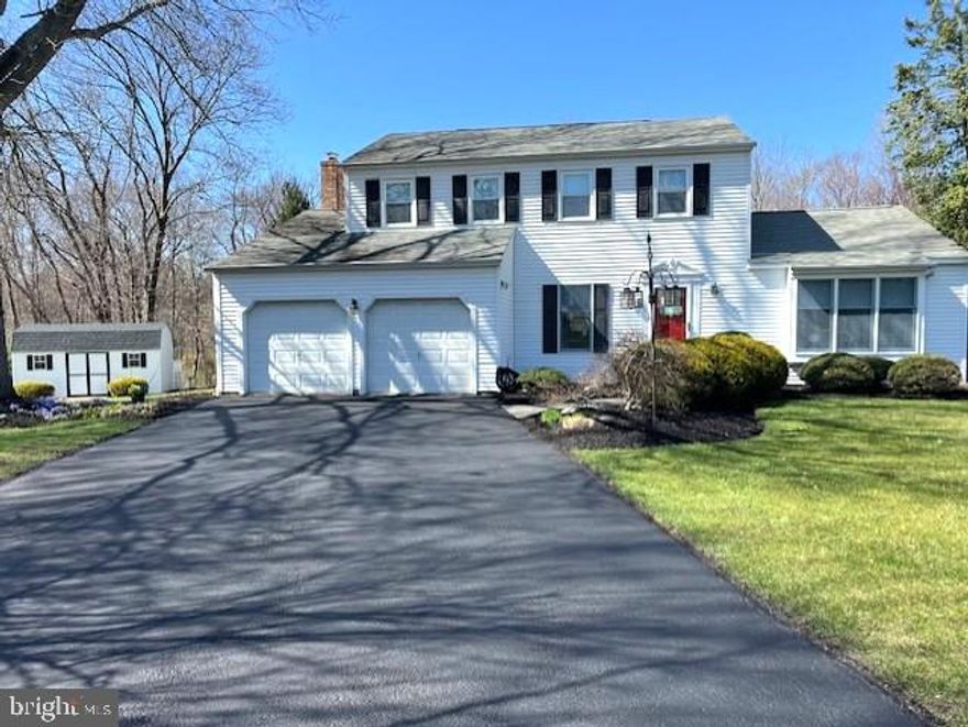 Nestled just minutes from the vibrant cultural scene of Doylestown, this stunning home offers both tranquility and convenience in the highly sought-after Central Bucks School District. Tucked at the end of a peaceful cul-de-sac and backing up to a lush forest that is part of the community common ground, this property offers a private retreat with modern amenities. Step outside and enjoy the expansive composite deck, added in 2017, which features a built-in fire pit and a retractable awning – perfect for entertaining or relaxing in nature. Inside, the home boasts a thoughtfully designed layout, with hardwood floors throughout the first and second floors, installed in 2019. The gourmet kitchen is a chef's dream, complete with a beautiful granite wrap-around breakfast bar that seamlessly flows into the open living spaces. The spacious family room, highlighted by a cozy wood burning fireplace insert with a circulator, is the perfect place to unwind. The living room impresses with its soaring cathedral ceiling, creating a bright and airy atmosphere. A library bathed in natural light offers a quiet place to read or work from home. The home also features all remodeled bathrooms, a finished basement with a walkout, and an extra room for storage. Recent updates include a new well pump (2023), central AC replacement (2020), and a freshly sealed driveway, ensuring peace of mind for years to come. The two-car attached garage with insulated garage doors adds additional convenience and storage space. And for those warmer months, a charming three-season room awaits. Don’t miss the opportunity to call this exquisite property home, where comfort, style, and nature converge.