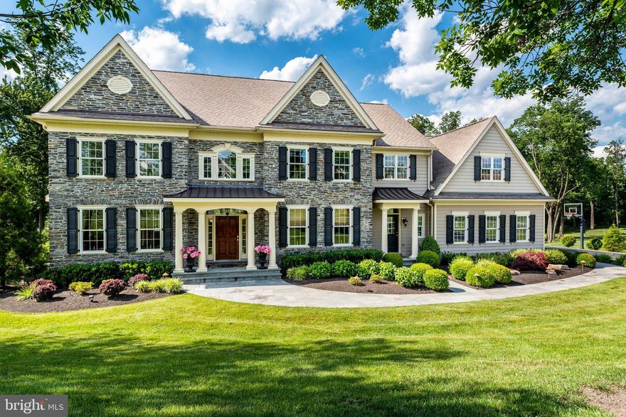 If you're looking for the "WOW! Factor", look no further.  126 Waverly Circle is a dream come true and will exceed all expectations.  It all begins with Control 4, a state of the art smart home operating system that connects virtually all of the technology in the home, making daily life a breeze.  This exquisite stone manor home captivates with timeless appointments and elegance.  You are welcomed by a gorgeous 2-story Reception Hall, formal Dining Room to the right and a handsome, cherry outfitted Library to your left.  The gourmet kitchen is the heart of the home with top of the line appliances.  The center island and counters are topped with a timeless, neutral granite.  A large eat-in-area with a coffered ceiling opens up to a splendid Family Room with a beautiful stone fireplace, built-in bookshelves, and plantation shutters.  The elegant fireside Living Room is bathed in natural light via the multiple sliding doors.  Completing the first floor is a serene Sunroom, 2 Powder Rooms, Mudroom with cubbies and a walk-in closet, and a formal Butler's Pantry with wine refrigerator.  Upstairs, a sumptuous Master Suite awaits which features a lovely Sitting Area, a massive walk-in closet, and Bathroom graced with double vanities, a steam shower, and soaking tub. There are 2 additional ensuite bedrooms while the remaining 2 bedrooms share a Jack and Jill Bath.  A convenient 2nd floor Laundry and a fabulous Loft area complete the second floor.  The Garden Level is a recreational haven for billiards, a workout, or a night at the movies.  The 8 seat theatre with bar area and popcorn machine provides a reason to never pay for Regal Cinemas again!!  A full bath, wet bar with fridge, and large storage area complete this level.  Perhaps, the crowning jewel of this home is the outdoor oasis which was created in 2016 by Burkholder.  The beautifully landscaped backyard was integrated into one breath-taking entertainment area and no expense was spared!  The dream outdoor kitchen, firepit, and covered living room with TV surround the stunning heated pool and hot tub, all with the view of the lovely Pickering Creek Reservoir! Entertaining just rose to a whole new level and this is the place to be!!  The 3-car garage is completely outfitted with Garage Tek and as you can see...every space in this magnificent home is exceptional! Don't miss out - make an appointment today to see this stunning property.  You'll be glad you did because the memories you make here are the kind that last a lifetime!!