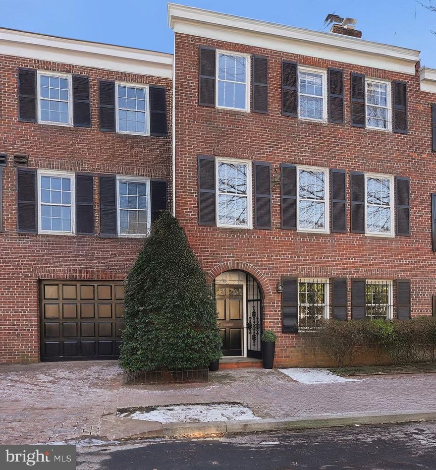 NEW LISTING WITH RARE 2 CAR PARKING AND POOL! Located in Georgetown’s West Village this gorgeous four-story residence features high ceilings, gracious proportions, and exceptional indoor-outdoor living. Offering 4 Bedrooms, 3 Full & 1 Half Bathroom plus Bonus Attic Room and approximately 4,351 total square feet, the home seamlessly blends classic architecture with thoughtful modern upgrades. The entry level is home to the fourth Bedroom with a lovely fireplace and en-suite Bathroom, a full-size Laundry Room and oversized Garage with interior access. The second level boasts a grand double Living and oversized Dining Room complete with wood-burning fireplace, beautiful built-in bookshelves and expansive ceiling heights. The main living level also features a gracious updated Kitchen with marble countertops and new appliances and elegant Powder Room. Beautiful French glass doors unveil an exceptional private outdoor oasis with landscaped gardens, patio space and a private salt chlorinated pool, creating a true resort-like setting in the city. Upstairs, the bedroom level provides generous accommodations, including a serene Primary Suite, additional well-proportioned bedrooms, and a lofted fourth floor bonus room with skylight—ideal as an office, lounge, or creative retreat—plus added storage. Recent improvements include a new roof (2025), new heating system, reclad chimney and a new smart-technology washer and dryer. Completing the offering is coveted two-car parking, including an oversized one-car garage with interior access into the house plus an additional surface parking space, and electrical capacity for an EV fast charger. A rare combination of grand scale, privacy, parking, and pool living—this is Georgetown living at its finest.