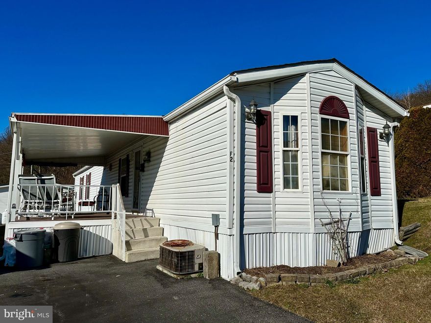 This spacious Mobile home features an open floor plan & split bedroom design. The primary suite has a walk-in closet and large bath with tub/shower. The guest bath is adjacent to the second bedroom and has a walk-in shower. Both bathrooms have new vinyl plank flooring, and there is lots of fresh paint too! The oak kitchen is in great shape and Washer and Dryer sit in a laundry closet just off the kitchen.  The huge covered porch is perfect for morning coffee and summer evenings. The shed has been freshly painted and the roof was just replaced, the exterior was power washed and new skirting has been installed. Definitely move in ready! This mobile home is in a 55+ community with a lot rent of only $550 which includes w/s/t and snow. Must have at least a 640 Credit score.