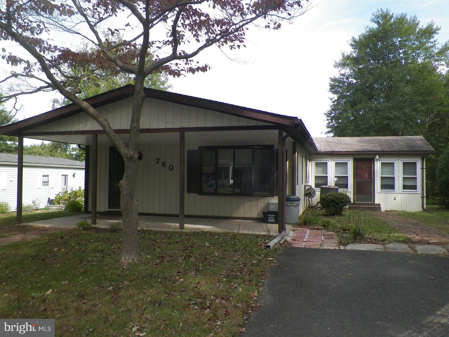 Attractive, cul-de-sac 2 bedroom, 2 bath home that sits besides the woods in the 55+ Community of Neshaminy Falls. Pull into your private 2 car parking space at the end of the road and walk onto a covered patio that has beautiful views to the surrounding nature. Enter into your spacious living and dining rooms that surround a roomy kitchen with breakfast bar; great for entertaining guests/family. Right outside your kitchen window or while lounging in the 13x11 enclosed sun room, you can see many deer as they pass through the open grounds around the home. This home comes with Anderson windows that keep it pretty comfortable especially ideal as the winter months are upon us. Set up your appointment soon to see this home.