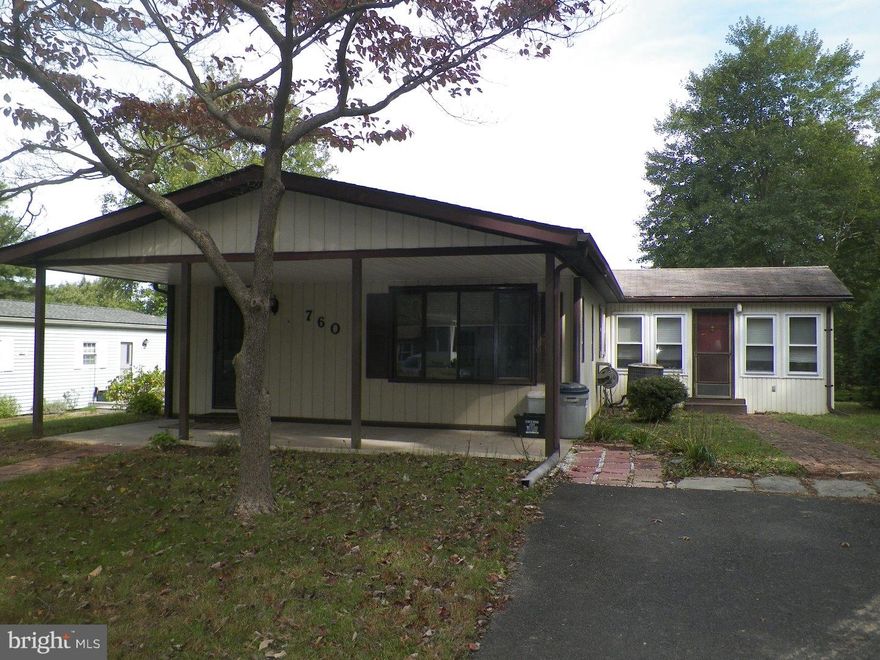 Attractive, cul-de-sac 2 bedroom, 2 bath home that sits besides the woods in the 55+ Community of Neshaminy Falls.  Pull into your private 2 car parking space at the end of the road and walk onto a covered patio that has beautiful views to the surrounding nature.  Enter into your spacious living and dining rooms that surround a roomy kitchen with breakfast bar; great for entertaining guests/family.  Right outside your kitchen window or while lounging in the 13x11 enclosed sun room, you can see many deer as they pass through the open grounds around the home.  This home comes with Anderson windows that keep it pretty comfortable especially ideal as the winter months are upon us. Set up your appointment soon to see this home.