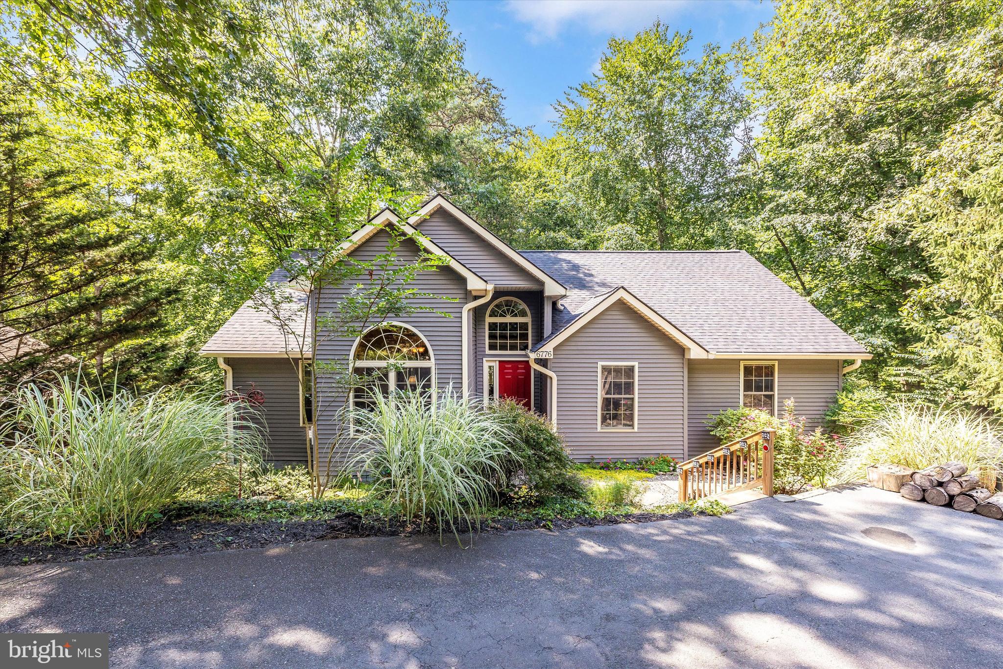 ***GORGEOUS & HARD TO FIND CUSTOM RANCH STYLE HOME THAT BACKS TO THE SIGHTS & SOUNDS OF THE BALMORAL CREEK RUNNING THROUGH IT***LOCATED IN A PERFECT SPOT WITH ONLY A SHORT WALK TO FABULOUS LAKE LINGANORE AND THE FAMOUS INDIAN CAVES***THIS LOVELY SUNLIT & OPEN FLOOR PLAN WITH ALMOST 3200 SQUARE FEET HAS 3 SPACIOUS BEDROOMS ON THE MAIN LEVEL AND 2 FULL BATHROOMS***THE STUNNING GREAT ROOM ENJOYS CATHEDRAL CEILINGS, A PELLET STOVE FOR WARMTH AND A BEAUTIFUL STONE FACADE***THE LARGE COUNTRY KITCHEN INCLUDES A WALK IN PANTRY, PENINSULA SEATING, NEWER STAINLESS STEEL APPLIANCES, SOLID SURFACE COUNTERTOPS & A BREAKFAST ROOM***SEPARATE DINING ROOM***THE HUGE FINISHED WALK OUT LOWER LEVEL HAS A 4TH BEDROOM, CRAFT ROOM/OFFICE, FULL BATHROOM, RECREATION ROOM, PELLET STOVE AND FULL KITCHEN AREA***DOUBLE DECKS & A LARGE BRICK PATIO ALLOW MULTIPLE & AMAZING OUTDOOR LIVING & ENTERTAINMENT SPOTS FOR PURE ENJOYMENT, INCLUDING AN OUTSIDE SHOWER***BRAND NEW ROOF IN NOVEMBER 2024***NEW HVAC SYSTEM 2019***CINCH HOME WARRANTY INCLUDED***COME ENJOY THE INCREDIBLE AMENTIES THIS COMMUNITY HAS TO OFFER***SWIM, BOAT, FISH, HIKE, BIKE, PLAY TENNIS OR PICKLEBALL, & ENJOY ALL FUN NEIGHBORHOOD EVENTS, INCLUDING SUMMER CONCERT SERIES, FOOD TRUCK TUESDAYS, FARMERS MARKET, FALLFEST, ETC***LOVE WHERE YOU LIVE***