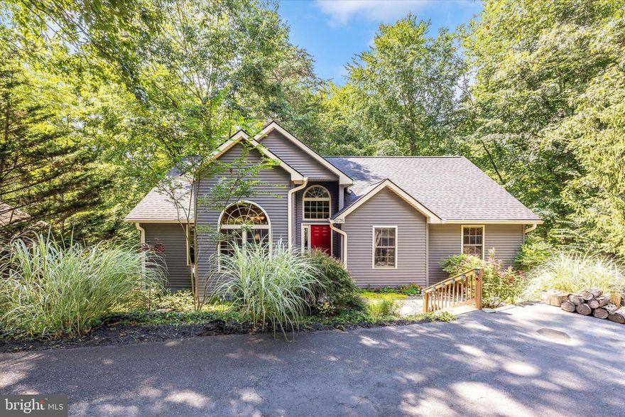 ***GORGEOUS & HARD TO FIND CUSTOM RANCH STYLE HOME THAT BACKS TO THE SIGHTS & SOUNDS OF THE BALMORAL CREEK RUNNING THROUGH IT***LOCATED IN A PERFECT SPOT WITH ONLY A SHORT WALK TO FABULOUS LAKE LINGANORE AND THE FAMOUS INDIAN CAVES***THIS LOVELY SUNLIT & OPEN FLOOR PLAN WITH ALMOST 3200 SQUARE FEET HAS 3 SPACIOUS BEDROOMS ON THE MAIN LEVEL AND 2 FULL BATHROOMS***THE STUNNING GREAT ROOM ENJOYS CATHEDRAL CEILINGS,  A PELLET STOVE FOR WARMTH  AND A BEAUTIFUL STONE FACADE***THE LARGE COUNTRY KITCHEN INCLUDES A WALK IN PANTRY,  PENINSULA SEATING, NEWER STAINLESS STEEL APPLIANCES, SOLID SURFACE COUNTERTOPS & A BREAKFAST ROOM***SEPARATE DINING ROOM***THE HUGE FINISHED WALK OUT LOWER LEVEL HAS  A 4TH BEDROOM, CRAFT ROOM/OFFICE, FULL BATHROOM, RECREATION ROOM, PELLET STOVE AND FULL KITCHEN AREA***DOUBLE DECKS & A LARGE BRICK PATIO ALLOW MULTIPLE & AMAZING OUTDOOR LIVING & ENTERTAINMENT SPOTS FOR PURE ENJOYMENT, INCLUDING AN OUTSIDE SHOWER***BRAND NEW ROOF IN NOVEMBER 2024***NEW HVAC SYSTEM 2019***CINCH HOME WARRANTY INCLUDED***COME ENJOY THE INCREDIBLE AMENTIES THIS COMMUNITY HAS TO OFFER***SWIM, BOAT, FISH, HIKE, BIKE, PLAY TENNIS OR PICKLEBALL, & ENJOY ALL FUN NEIGHBORHOOD EVENTS, INCLUDING SUMMER CONCERT SERIES, FOOD TRUCK TUESDAYS, FARMERS MARKET, FALLFEST, ETC***LOVE WHERE YOU LIVE***