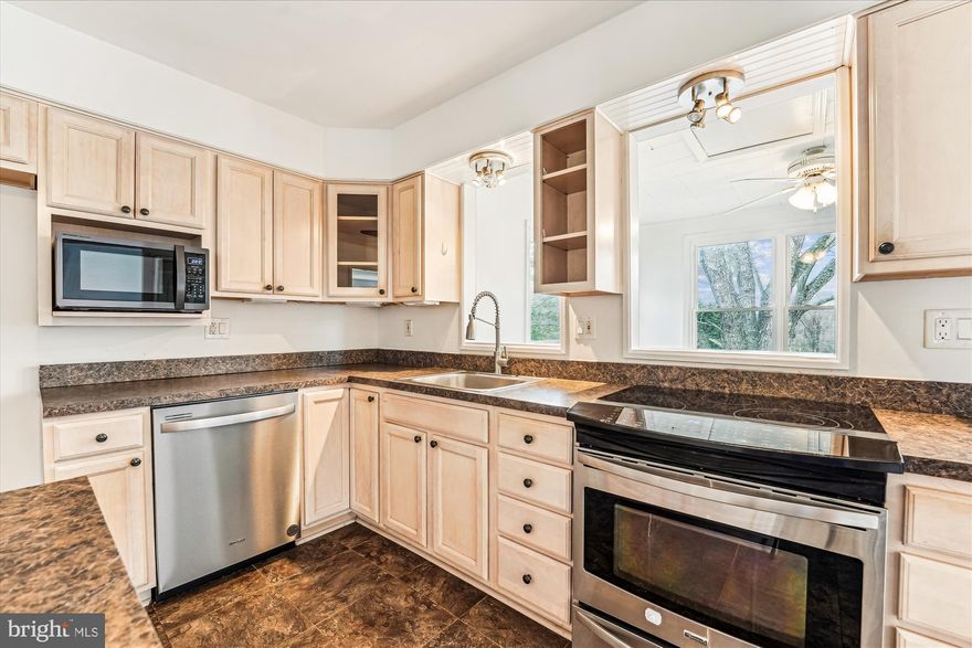 PRICE IMPROVEMENT AND A MOTIVATED SELLER!   --Welcome to 8475 Wedding Drive! This impeccably maintained 4-bedroom, 3-bath split foyer home offers over 2,600 square feet of finished living space on a peaceful and mostly cleared 3-acre homesite. This property offers a rare blend of privacy, flexibility, and modern upgrades—an ideal setting for those seeking a rural lifestyle with easy access to major routes or the ability to work from home (FIOS). 
        Step inside to find a bright, open-concept layout with beautifully refinished solid hardwood floors and fresh interior paint throughout. The renovated kitchen features stainless steel appliances, updated cabinetry, luxury vinyl tile flooring, a center island for preparation space and extra cabinet storage, and a separate coffee bar that’s perfect for your morning routine. Adjacent to both the kitchen and dining room is the breakfast room, which features an abundance of natural lighting and overlooks the rear yard, offering walkout access to a spacious, step-down deck—ideal for entertaining or simply enjoying the quiet rural setting.
        Upgrades include a newer roof, a recently replaced HVAC system and furnace, newer double-hung vinyl windows, and a finished, oversized garage that doubles as a workshop, previously converted from the original carport. The walkout lower level offers additional living space with a large recreation room featuring a custom brick wood-burning fireplace, a fourth bedroom that functions perfectly as a guest suite or Au Pair space, a full bath, and a walkout laundry/mud room. There is even direct access to the garage from the lower level.
       The surrounding land offers space and flexibility rarely found, making it perfect for gardening, keeping animals, adding a barn or outbuilding, or even expanding the home if desired. With the property’s layout, zoning, and rural setting,  it’s a great candidate for a small farmette setup.
        Located in the heart of Welcome, Maryland, this property offers a unique blend of rural charm and convenience. It’s just minutes from Maryland Route 6, providing easy access to La Plata, Port Tobacco, and the greater Washington D.C. metro area. Nearby attractions include the Thomas Stone National Historic Site, the Port Tobacco Historic District, and an array of recreational options like boating, fishing, hunting, hiking, or some limited equestrian activities at Chapel Point State Park, Cedar Point Wildlife Management Area, or Nanjemoy Wildlife Management Area with combined acreages of more than 4,000 acres! 
     This is your opportunity to enjoy peaceful country living with room to grow, inside and out. Schedule your private tour today—this one won't last long!