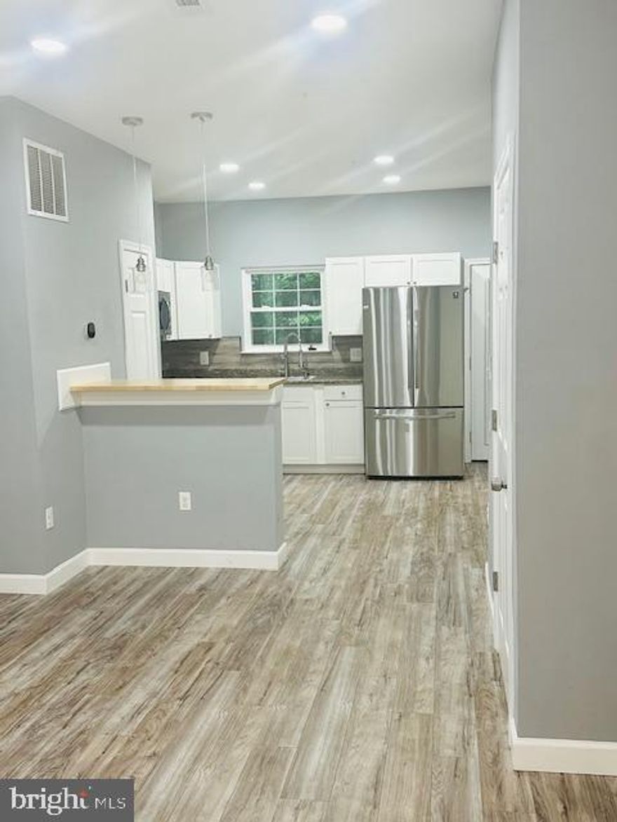 Step into this meticulously renovated end unit town home. This home includes luxury vinyl floors throughout the main and upper levels with tons of natural light. The eat in kitchen offers stainless steel appliances, large breakfast bar with access to a generous sized wooden deck through the patio double doors.  The upper level features 3 bedrooms and a full bathroom with great updates. The primary bedroom offers an en-suite with a stand up shower with modern fixtures.  Enjoy the lower level that has an additional bonus room that can be used for extra living space or recreation fun and storage along with an additional bathroom and laundry room combo.  This homes centers around convenience, surrounded by major highways and essential shopping areas.  The only thing this home is missing... is YOU!  Welcome Home!
The application fee is $50 for each adult 18 and over.  Minimum credit score required is 650.  No eviction history, one year lease minimum, income/employment verification. 
*HOA is included in monthly rent