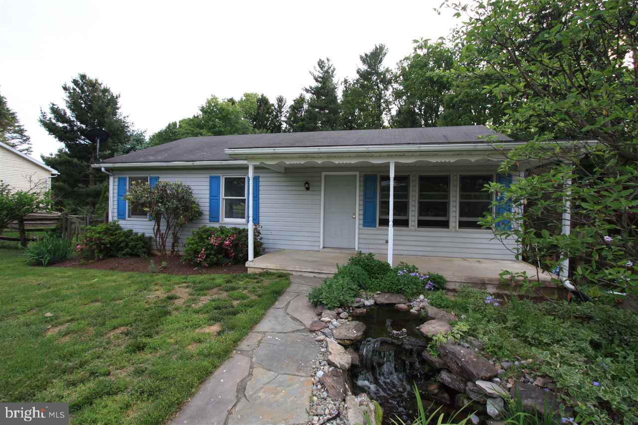 Back on the market, buyer financing fell through! Charming 3BR Rancher in quiet, rural location. 3/4 acre property extends into the woods. Freshly painted with new carpet and flooring. Eat-In Kitchen includes new counter top. Walk-out Basement ready to finish.