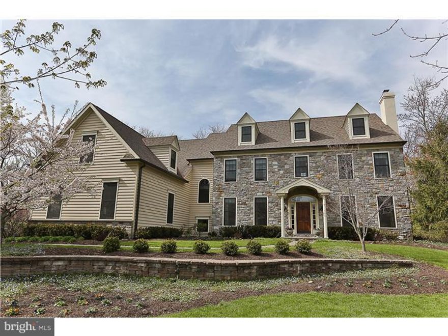 Fabulous, elegant, neutral and pristine Philomino & Salamone built center hall colonial with attention to detail throughout, perfect for family living and entertaining, in the wonderful enclave of Parsons Glen. Gorgeous hard wood floors, custom wainscoting, dentil and crown molding abound. A welcoming foyer leads to the elegant living room with marble surround gas fireplace to the right and gracious dining room with tray ceiling to the left. Beyond the hallway ahead is the formal staircase to both the upstairs living quarters and the decked-out basement. A second staircase from the kitchen also leads to the upper and lower levels. The chef's kitchen has stunning custom cabinetry, professional high end SS appliances, center island, granite counter tops and sunlit breakfast area. Dramatic two-story family room is open to the kitchen, has an impressive full length stone fireplace and plenty of light. Handsome library/office with custom built-ins, a mud room with custom cubbies, a formal powder room and a second half-bath complete the main level. Upstairs offers an expansive master suite with stunning master bath, professionally fitted walk in closet, a dressing room and sitting room. Three additional bedrooms have private or Jack and Jill bathroom. Beautifully finished third level offers a 5th bedroom with full bath. The basement has built in cabinetry, an exercise area, full bath and more. Professionally landscaped grounds with irrigation system, beautiful paver patio with stone enclosure.   Marvin windows,intercom, central vac are only some of the additional upgrades. This is a treasure to call home.