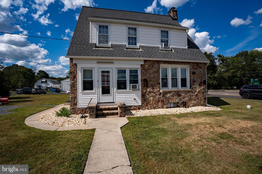 Charming Stone Cottage on a Spacious Corner Lot
Welcome to this delightful 3-bedroom, 1-bath stone cottage that perfectly blends classic charm with modern updates. Nestled on a generously sized corner lot, this home offers excellent curb appeal and a peaceful setting in beautiful neighborhood.
Inside, you'll find rich wood flooring throughout, adding warmth and character to every room. A recently installed brand new roof and new windows ensure comfort, efficiency, and peace of mind for years to come. The light-filled four-season sun porch is perfect for relaxing with a morning coffee or enjoying cozy evenings year-round.
The layout includes three comfortable bedrooms, a full bathroom, and plenty of natural light. Outside, the property features a detached 2-car garage, ideal for storage or workshop space, and plenty of room to garden, play, or entertain.
This move-in ready home offers a rare combination of charm, space, and updates—schedule your showing today and come see all it has to offer!