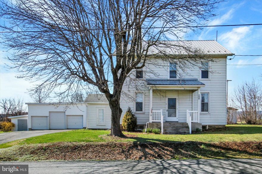 This charming farmhouse-style home, originally built in 1900 and beautifully renovated in 2002, offers a perfect blend of historic character and modern comfort. With over 1900 square feet of thoughtfully designed living space, this residence features four spacious bedrooms and two full bathrooms, making it an ideal retreat for those seeking both space and warmth. Nestled on a generous 0.56-acre lot, the property boasts a detached garage with ample parking, accommodating up to ten vehicles. The inviting interior showcases a cozy fireplace, perfect for gathering with loved ones during chilly evenings. The combination of hardwood, carpet, and vinyl flooring adds a touch of elegance and practicality throughout the home. Located in a vibrant community, this home is surrounded by friendly neighbors and offers easy access to local parks, providing a wonderful opportunity for outdoor activities and relaxation. The area is known for its excellent public services and well-maintained facilities, ensuring a comfortable lifestyle for all residents.  This property is not just a house; it's a place to create lasting memories and enjoy the comforts of home.