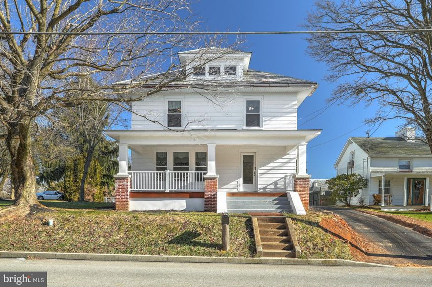 Small town charm and character await you in this beautiful Colonial at the end of town.  Situated on almost half an acre and backing up to an open field makes the outdoor space appealing to those who like to be outdoors and for any fur babies.  Go inside and find beautifully refinished hardwood floors along with chestnut trim and accents to show off the charm of yesteryear.  All windows have been replaced, kitchen has been fully renovated with stainless steel appliances and a brand new full size washer and dryer added to the half bath on the main level.  Main floor has a large living room and private dining room with multiple windows for lots of natural light.  Upstairs you'll find 3 large bedrooms, a bonus room you could use for a walk in closet/changing room and a remodeled bathroom with clawfoot tub and a covered porch overlooking the beautiful back yard.  There is also a front porch with new flooring, a one car garage and storage shed.  Close to MD line and 83 for commuters to Baltimore, York and Harrisburg. Close to restaurants and shopping.  Don't miss your chance to see this charmer before it's gone!