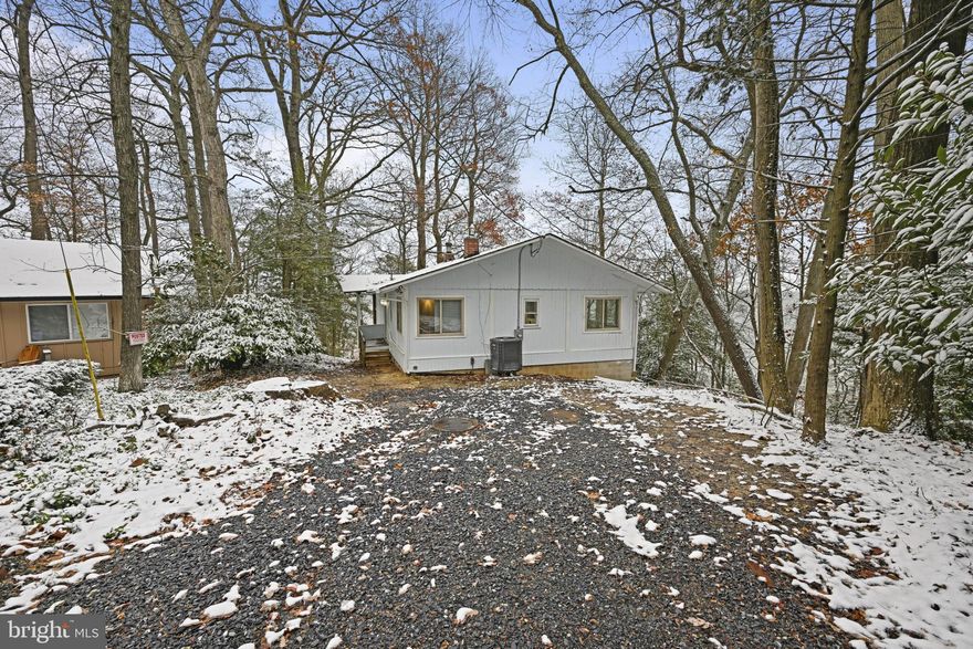 Welcome to this spacious and well-maintained home located on a quiet cul-de-sac in the desirable Chesapeake Ranch Estates community. Offering over 2,000 square feet of finished living space, this property features a bright main level with an open layout, large windows, and comfortable everyday living areas. The kitchen flows directly into the dining and living spaces, making it ideal for both daily use and entertaining.

The home includes a finished basement that adds valuable extra living space—perfect for a family room, recreation area, office, or guest space. With two full bathrooms, a cozy fireplace, and generous room sizes throughout, this property offers flexibility for a variety of lifestyles.

Situated on a large, wooded lot, the property provides privacy, outdoor space, and room to relax. Enjoy all the amenities Chesapeake Ranch Estates has to offer, including beaches, a lake, community center, playgrounds, and convenient access to local shops, schools, and major routes.