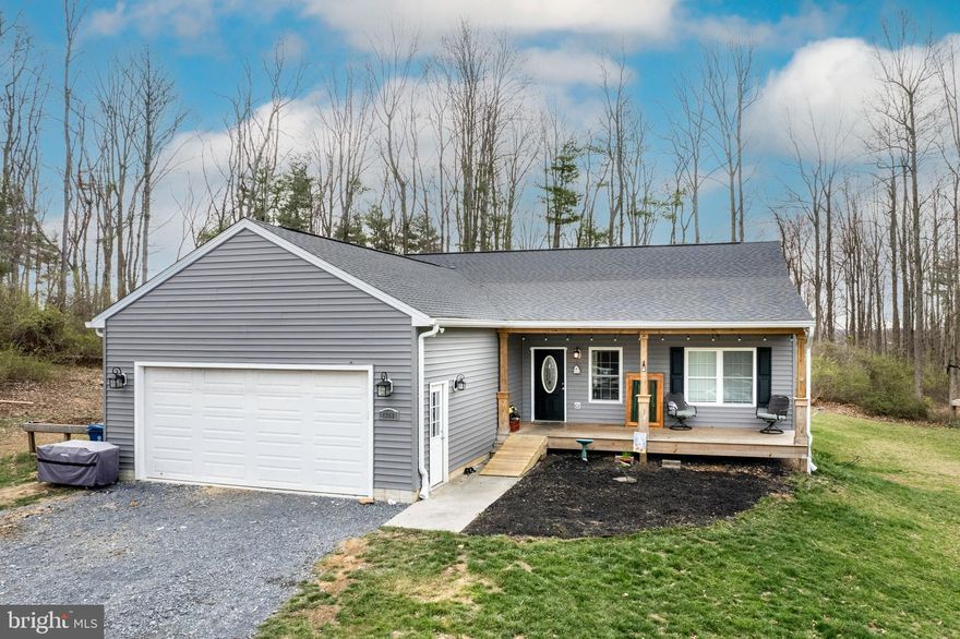 Price improvement!! Welcome to 1353 Clear Spring Dr! Seller is offering a $5,000.00 credit towards flooring! This charming home, built in 2020, is truly a hidden gem nestled on nearly 5 acres of picturesque land. With 3 bedrooms, 3.5 bathrooms, and 1,885 square feet of living space, this property offers a serene escape from city life. Have peace of mind with roof and major systems only 4 years old!

Walk out basement has a full bath and ready to be finished off. Plenty of outdoor space for deck and or patio. Tons of potential! Imagine sipping your morning coffee on the front porch, surrounded by nature and fruit trees. And for those who love adventure, the property comes complete with a rock wall/swing and a zip-line!

Close to major shopping, restaurants and commuter routes but quietly tucked away!