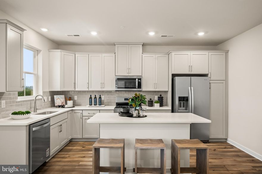 Start 2026 in a fresh, modern 3 BR, 2.5 BA townhome at Phoenixville Heights! Discover a stylish new community just minutes from vibrant downtown Phoenixville, with direct access to the scenic Schuylkill River Trail — perfect for walking, biking, and weekend adventures.

850 Graphite Drive showcases the popular Piper floorplan, designed for low-maintenance living with smart layouts and on-trend finishes throughout.

The entry level welcomes you with a bright foyer and convenient inside access from the garage.

On the main level, enjoy an airy open layout connecting a spacious Great Room with a sleek, modern kitchen. You’ll love the stainless steel counter-depth side-by-side refrigerator, quartz countertops, upgraded cabinetry, and glossy designer backsplash — all among the most sought-after upgrades already included. The dining area opens to a composite deck with white vinyl rails, perfect for relaxing or entertaining.

Upstairs, all three bedrooms offer comfort and privacy. The owner’s suite features its own private bath, while secondary bedrooms provide flexible space for guests, a home office, or hobbies. Additional highlights include stained oak stairs with painted risers and an optional first-floor powder room for extra convenience.

A roomy garage with inside access completes this well-designed home, blending style, functionality, and a fantastic lifestyle-focused location.

And for pet lovers? Phoenixville Heights features a charming community dog park, making it an ideal spot for homeowners who want a low-maintenance home and space for their pups to play. Move-in ready, beautifully finished, and close to everything Phoenixville has to offer — don’t miss your chance to make this your next home!

Note: Model homes now ready to tour! Prices, dimensions, and features may vary and are subject to change. Photos are for illustrative purposes only - please see new home consultant for final options and finishes. If you’re working with a Realtor, please ensure they are acknowledged as your representative during your first interaction with Lennar and accompany you on your first visit. Taxes are assessed after settlement. Please visit the sales trailer for open house access.