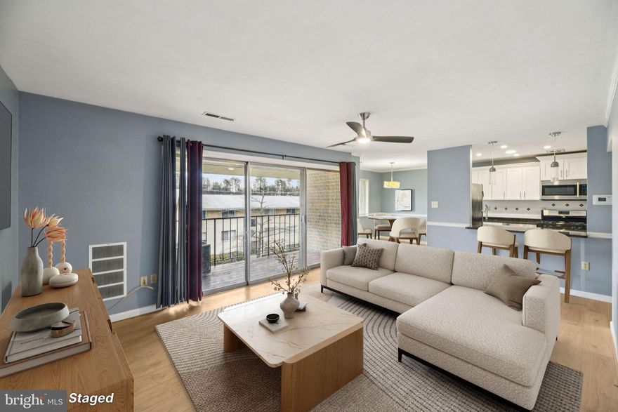 Welcome to this sun-filled, fully updated & spacious two-bedroom, one full bathroom condo with an incredible location! This quiet, 2nd level, top floor condo has an expansive living room with excellent natural light and sliding glass walkout to the balcony. Adjoining the living room are the kitchen and dining room.  The open & updated kitchen features granite counters, gorgeous white cabinetry, stainless steel appliances, recessed lighting, ceramic tile floor and gas cooking.  The separate dining room has great natural light as well.  Both bedrooms have good sized closets, ceiling fans and the full bath is completely updated.  Enjoy the spacious landscaped common areas and playground as well as the outdoor pool at the Carrollan Gardens Condominium, a pet friendly community. With incredible access to public transportation, this home is just a half mile to the New Carrollton Metro Rail, Amtrak, Marc train stops and a Metro Bus stop is right at the community entrance. This home offers a convenient and central location near shopping, the West Lanham Hills neighborhood park, and the Lanham Forest Recreation Center, all just minutes from I-495.