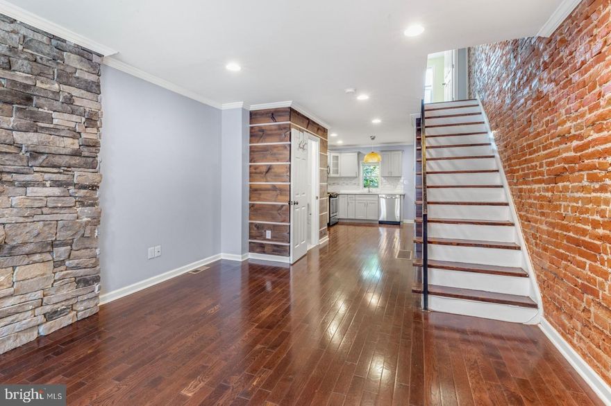 Welcome to this 2BR/1.5BA rental with central air, finished basement, recessed lighting, and gorgeous hardwood floors throughout. Enter into the open layout living/dining/kitchen area accentuated by exposed brick and modern wood-paneled accent walls.  Move past the conveniently located 1st floor powder room to the sleek, modern kitchen with granite countertops, tile backsplash, stainless steal appliances, and shaker-style, soft-close cabinets with plenty of storage. Follow the exposed brick wall upstairs to the two bedrooms, with the front bedroom featuring a gorgeous exposed brick wall. The large full bathroom offers dual sinks with lighted vanity, a shower/tub combo, and tons of natural light streaming in from the skylight. Downstairs, you'll find the finished basement, perfect for a second living room, home gym, office, or flex space, and a separate laundry area.  Located on a quiet street near Wharton Street Playground, Christian Street YMCA, Point Breeze Avenue, and great shopping options in the area. Near local favorites like American Sardine Bar, On Point Bistro, Dock Street, Porcos Porchetteria, Two Eagles Cafe, The Tasty Toast, 22nd St Cafe, Lounge 21, Los Camaradas, Batter & Crumbs Vegan Bakery, Circles Thai, and countless more. Schedule your tour today!