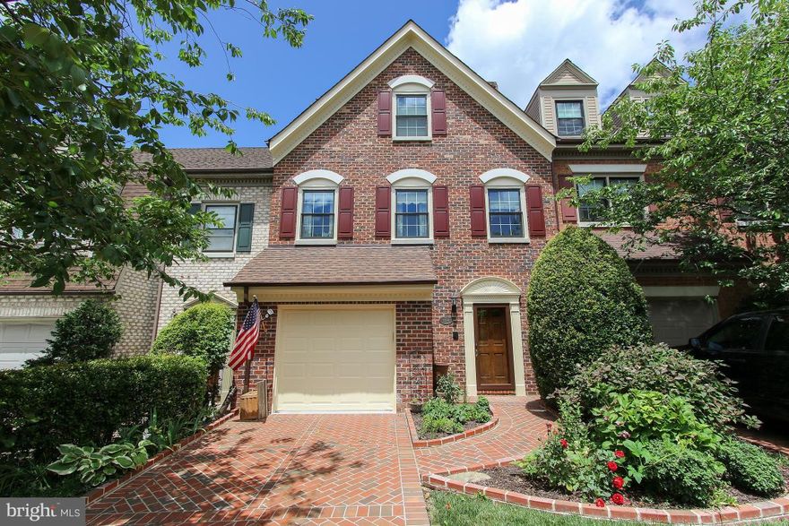 STUNNING! 4 levels of luxury living. Elegant townhome in sought after Landmark Mews. 3 large bedrooms w/3 full & 2 half baths Fab living room, sep. dining room, dazzling gourmet kitchen w/ Jenn-Air appl, huge family room, 2 fireplaces, deck off kitchen, walk out lower level to brick terrace. Garage, laundry room....the list goes on & on. Express bus to Pentagon at corner. Don't miss this one!!!