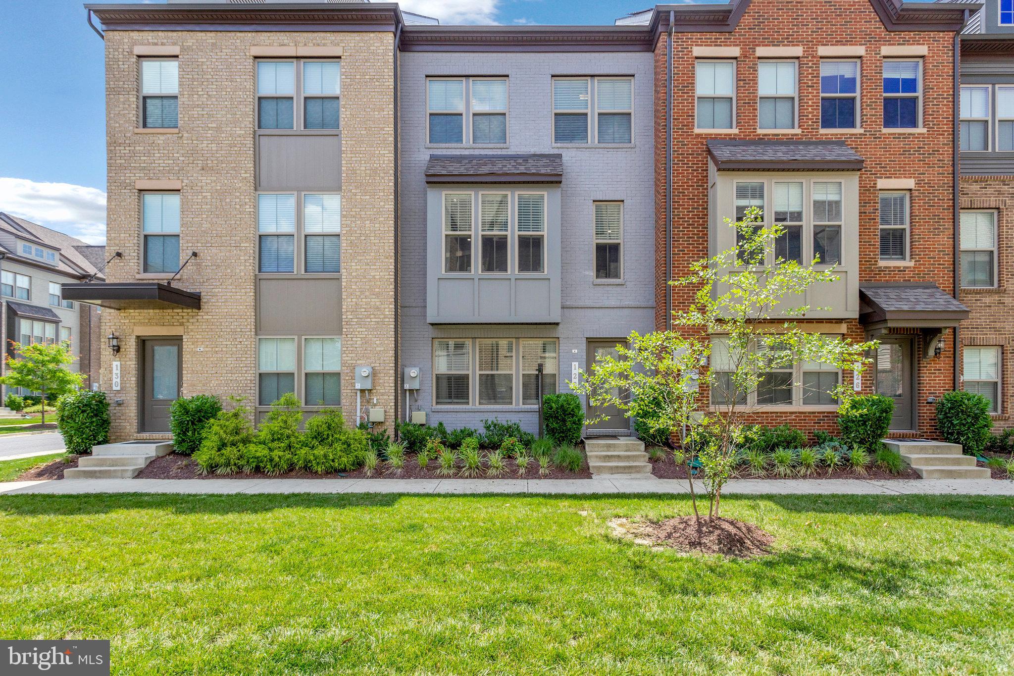 Welcome home! Nestled in the idyllic community of Capital Court, this stunning townhome boasts modern, sophisticated finishes and light-filled spaces on all three levels. Less than 5 years old, this home has all the modern updates of a new construction home! Upstairs, gleaming hardwood floors flow seamlessly throughout the main level’s open floorplan. In the center of the home, the gorgeous gourmet kitchen boasts stainless steel appliances, sleek granite countertops, and a chef’s pull out faucet. With an oversized island bar and stylish pendant lighting, this kitchen was made for entertaining. On one side of the kitchen you’ll find the spacious living room, where wall-to-wall windows flood the home with natural light. On the back of the home, the kitchen opens directly into the dining area, providing you with an effortless spot for dinner parties or grilling on the adjacent deck. Upstairs, the peaceful primary bedroom suite features an on-trend accent wall and plush carpeting, plus a massive walk-in closet. Inside the sophisticated en suite bathroom, you’ll find a wide double sink vanity and frameless glass door shower, with modern, elegant finishes. Both additional bedrooms include soft carpeted flooring and wide closets, with shared access to the second tasteful bathroom in the hallway. For the height of convenience, laundry is available on the bedroom level of the home. Downstairs on the entry level, a bright bonus room provides you with the flexibility for a cozy home office or gym. Access to the two-car garage and wide driveway can also be found on this level, offering you an abundance of space for both storage and convenient parking for you and your guests. Just minutes to Shoppers, Giant, Wegmans, Bowie Town Center, Prince George’s Sports & Learning Complex, Northwest Stadium, and NASA Goddard Space Flight Center, as well as Joint Bases Andrews and Anacostia-Bolling. Only one mile to the Downtown Largo Metro Station, with quick access to I-495, Central Avenue, Largo Road, Route 50, Martin Luther King, Jr Highway, and Crain Highway. Schedule a private tour of your exquisite new home today!