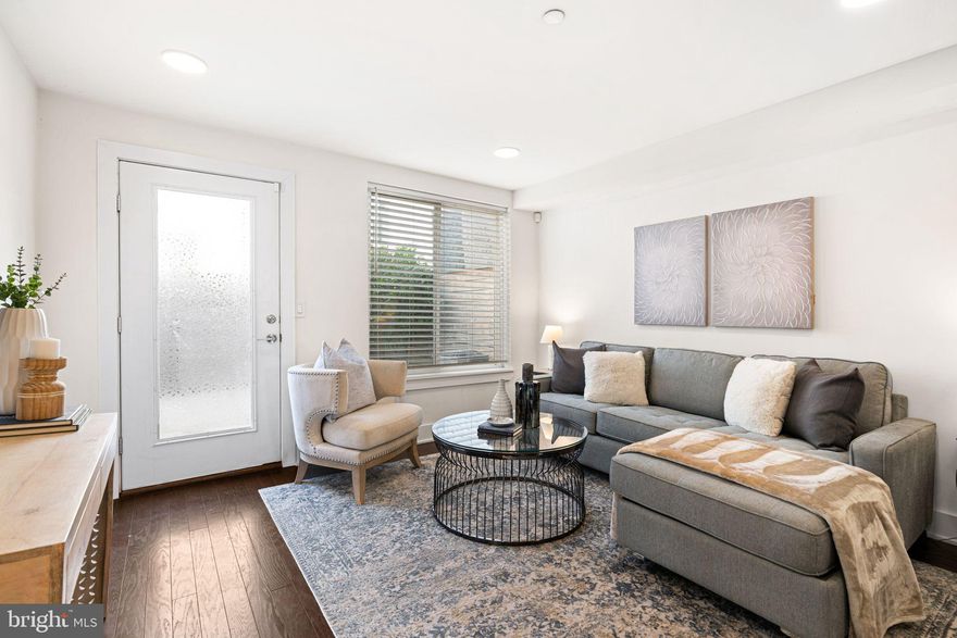 We present to you this newly renovated Condo with Modern Charm and a Spacious Patio. 

A Stylish interior, private outdoor space, and tax savings perfectly located with easy access to major highways, shopping, dining, and recreational spots. Whether you're commuting or exploring, this home puts you at the center of convenience and accessibility.

Step inside to discover a sleek, designer galley kitchen featuring light gray shaker cabinets and a luxurious marble-tiled backsplash, offering ample storage and counter space for cooking or entertaining. The open dining and living area flows effortlessly into your private, spacious patio—ideal for relaxing or hosting gatherings. Downstairs, you’ll find two large bedrooms, along with a convenient laundry room and a beautifully curated full bathroom and half bathroom designed for comfort and style. The home also features an enclosed outdoor space at the rear, ideal for extra storage.

This first-floor unit offers modern updates, low-maintenance living, low HOA fees and significant tax savings with part of the original 10-year tax abatement still in effect. Perfect for buyers seeking comfort, convenience, and value in a vibrant community.

Your new home awaits, schedule a showing today! Take advantage of this unique opportunity and experience the perfect blend of modern design and functionality.