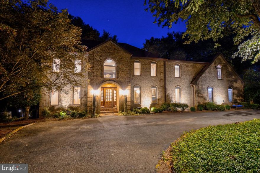 DEADLINE FOR OFFERS: TUESDAY, AUGUST 29 @ 9AM.
Welcome to your dream retreat in the heart of North Potomac, Maryland. Nestled on a sprawling 2.37-acre lot, this luxurious custom-built brick home offers the perfect blend of elegance, comfort, and outdoor entertainment. As you approach the property, you'll be greeted by a stately circular private driveway entrance from the cul-de-sac, offering plenty of off-street parking space for visitors. Step into the two-story foyer and you'll immediately appreciate the craftsmanship and attention to detail that went into creating this custom-built home. The main level boasts spacious living areas bathed in natural light. Gleaming oak hardwood floors, large, paneled glass exterior doors, and custom finishes add to the home's charm. The gourmet kitchen is a chef's delight, featuring stainless appliances, granite and quartz countertops, double ovens, and an island for both cooking and gathering. Stepping from the kitchen into the adjoining two-story family room, a cozy gas fireplace invites you to relax on cooler evenings. The formal dining room and living room provide the perfect backdrop for entertaining guests. This level also features an enclosed office which could easily be used as a main level bedroom, conveniently located next to the bathroom with full slate tiled shower. There is a spacious mud room accessible from the kitchen complete with high efficiency laundry machines, served by a laundry chute conveniently connected from the bedrooms above- the mud room serves as a point of entry from the large three car side load garage.
Another unique feature of this property is the rear wraparound deck, accessible from multiple points of exit in the family room and kitchen, offering scenic views of the expansive backyard. It's an ideal spot for morning coffee or evening sunsets. Follow the formal front staircase, or the rear casual staircase from the kitchen to the upper level, boasting four generously sized bedrooms and three full baths, providing comfort and privacy for all. The primary suite is a true oasis, featuring heated floors, a spa-like bath with a jetted tub, a separate shower with large seat, private water closet and dual vanities. The large wall of windows at the bathtub overlook the gorgeous backyard. Ample walk-in closet space ensures that storage is never an issue. The primary suite has its own gas fireplace and built-in cabinetry, as well as a private staircase to a loft with several skylights that could serve as an inspiring office space, yoga room, or private library! The remaining bedrooms are large and spacious- one with its own ensuite bath, and the remaining two flanking the third full bath between them. The walkout basement is an entertainer's paradise! The basement even has two staircases- one entering the common area from the Family Room above, the other leading to the mud room providing a private secondary exit to the upper level from the bonus room and full bath. This level is complete with a wet bar, a recreation area with a generously sized gas fireplace hearth, a full bath serving the recreation space, a fitness room, and a bonus room with an attached second full bath! From here, step outside to the covered patio and out to the private sprawling backyard, complete with stunning heated in-ground saltwater pool, surrounded by a generously sized hardscape patio for sunbathing and summer gatherings. The home is even equipped with a backup generator! With 2.37 acres of land at your disposal, there's plenty of room for outdoor activities, gardening, or even expanding your outdoor amenities. Situated in tranquil privacy while conveniently located within a minute’s drive to Potomac Oak shopping center for conveniences, dining, and a daily farmstand in the summer, also easily accessible to major commuter routes. Don't miss your chance to call this exquisite property your own!