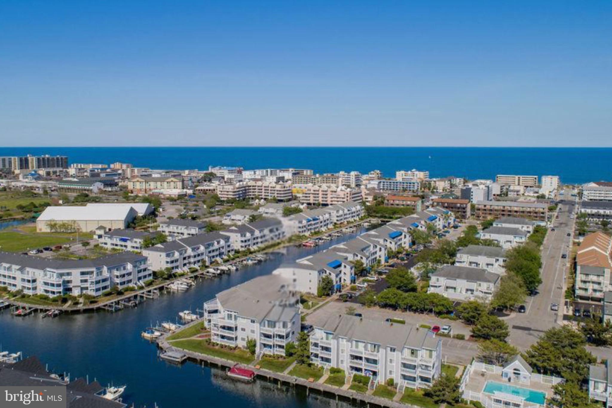Waterfront living at its finest! Welcome to one of North Ocean City’s premier waterfront communities, Hidden Harbour! You are sure to love this completely updated waterfront condo with Southwest exposure and a large oversized balcony to take in fantastic water views, sunshine, and stunning views of the fireworks at Northside Park!
This condo features a great open layout with two bedrooms and two full bathrooms. Updates include new luxury vinyl plank flooring, updated cabinets, new appliances, new backsplash, granite counters. New water heater, plantation shutters, and a retractable awning on the balcony, Updated bathrooms, new furniture and fixtures.
Enjoy the natural light streaming through the multiple windows and balcony sliders. Hidden Harbour offers a community pool, two parking spaces, and a highly desirable North Ocean City location. Situated just three blocks from the beach and within close proximity to Northside Park, shopping, and restaurants, this condo is perfect for both relaxation and adventure. Plus, you can hop on your boat from your private boat slip for even more waterfront fun.
Don’t miss this incredible opportunity to own a slice of paradise, just in time to enjoy the summer of 2025!