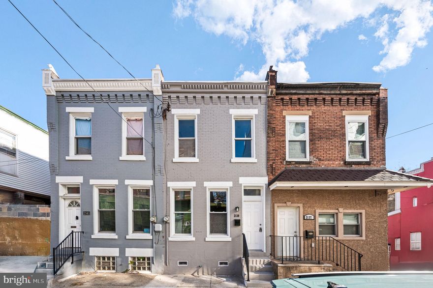 Welcome to 2139 N. 10th Street, a newly renovated rental home offering modern finishes and unbeatable proximity to Temple University. Available for immediate occupancy, this home features an open-concept living and dining area with 10+ ft ceilings and oversized front windows that create a bright, airy feel from the moment you walk in. The updated kitchen is thoughtfully designed for both style and function, complete with granite countertops, white cabinetry, stainless steel appliances, and a classic subway tile backsplash.
Upstairs, you’ll find two well-sized bedrooms, including one with exposed brick that adds warmth and character. The full bathroom is finished in a clean, modern palette with ceramic tile throughout for a timeless look. Located in a rapidly growing neighborhood just minutes from campus, Broad Street cafés, and local shops, commuting is effortless with easy access to SEPTA’s Temple Station, the Broad Street Line, and multiple bus routes. Freshly renovated, well-located, and move-in ready,  this is an ideal rental opportunity for students or professionals seeking comfort, convenience, and modern living near Temple. Applications accepted online via RentSpree. First month, last month and security required for move-in.