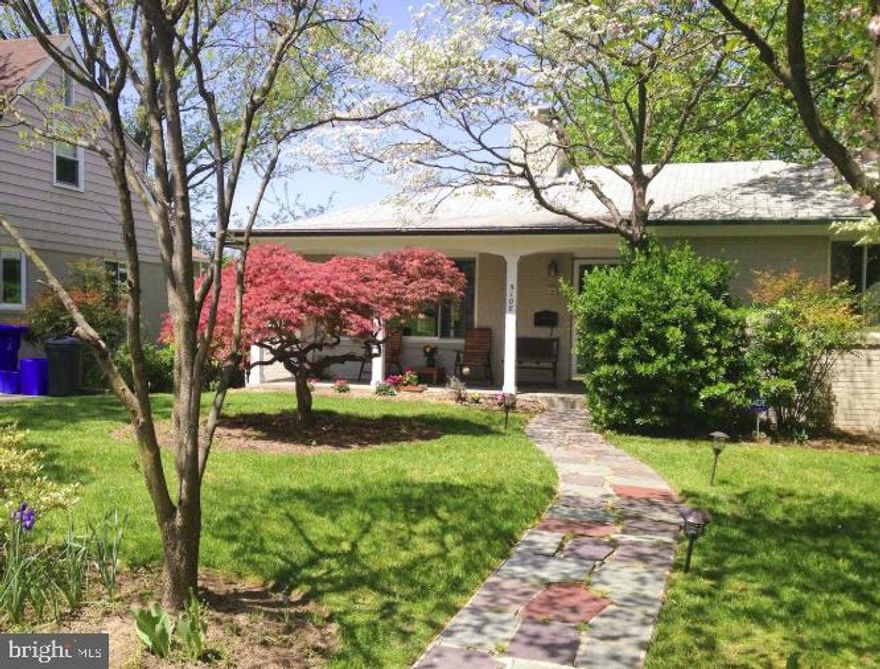 Brimming with convenience in the heart of the tree-lined community of Westgate, this charming rambler features three bedrooms, two-and-one-half bathrooms, sun-filled spaces, and is surrounded by beautiful mature trees. Offering classic and elegant details, including hardwood floors and mouldings, arched doorways, oversized windows, generous room sizes, and wonderful living spaces. The perfectly planned rooms offer terrific flow for daily living and entertaining, both indoors and out - with an expansive front covered porch, as well as a rear deck overlooking a back patio surrounded by lush grounds with mature trees ensuring the utmost privacy. Approached by a stone walkway surrounded by a front lawn with flowering shrubbery, the main level boasts a dedicated foyer, an inviting and expansive living room anchored by a brick fireplace and two sets of oversized windows.  The eat-in kitchen creates a delightful environment for cooking and gathering. Entertaining is a breeze in the adjoining spacious and bright dining room. Two main level bedrooms, plus a full bath and a lovely powder room, create an easy-living environment. The third bedroom and another full bath are located on the finished, walk-out lower level, which also features a recreation / family room adorned with a brick fireplace. Welcome home to this delightful residence offering comfort and convenience with local restaurants, shopping, parks, and recreational activities nearby. Westbrook, Westland, and B-CC school serve the neighborhood.