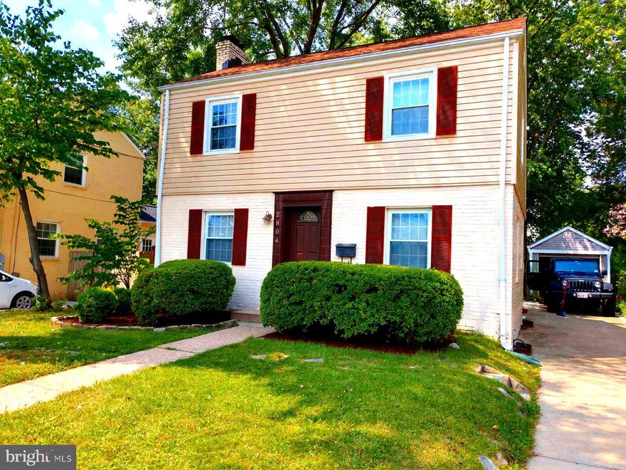 Offered below tax assessed value. Located in one of Alexandria's finest neighborhoods, situated in the Beverley Hills section of North Ridge. Walk across the street to George Mason Elementary, fields, playground and tennis courts. The long driveway offers plenty of off street parking and leads to the original detached garage. The lot is flat with a fully fenced back yard that can be accessed from the large family room addition. Stepping outside to the gorgeous yard, where you'll find the ideal setting for outdoor gatherings, barbecues, and relaxation. Lovely and spacious center-hall colonial with hardwood floors throughout main house and  carpet in family room. Updated kitchen with Corian counter tops and sink. Lots of cabinets and laminate floor. Unfinished basement great for laundry, storage and workshop, which has the potential of being converted to the fourth bedroom. Central A/C with gas heat and hot water. Fireplace on the main level is fully functional and great for a cozy winter night. Quick commute to any location in Alexandria, District of Columbia, Crystal City Arlington and the airport. Commuting is a breeze living in the heart of Alexandria City - this is an opportunity not to be missed!