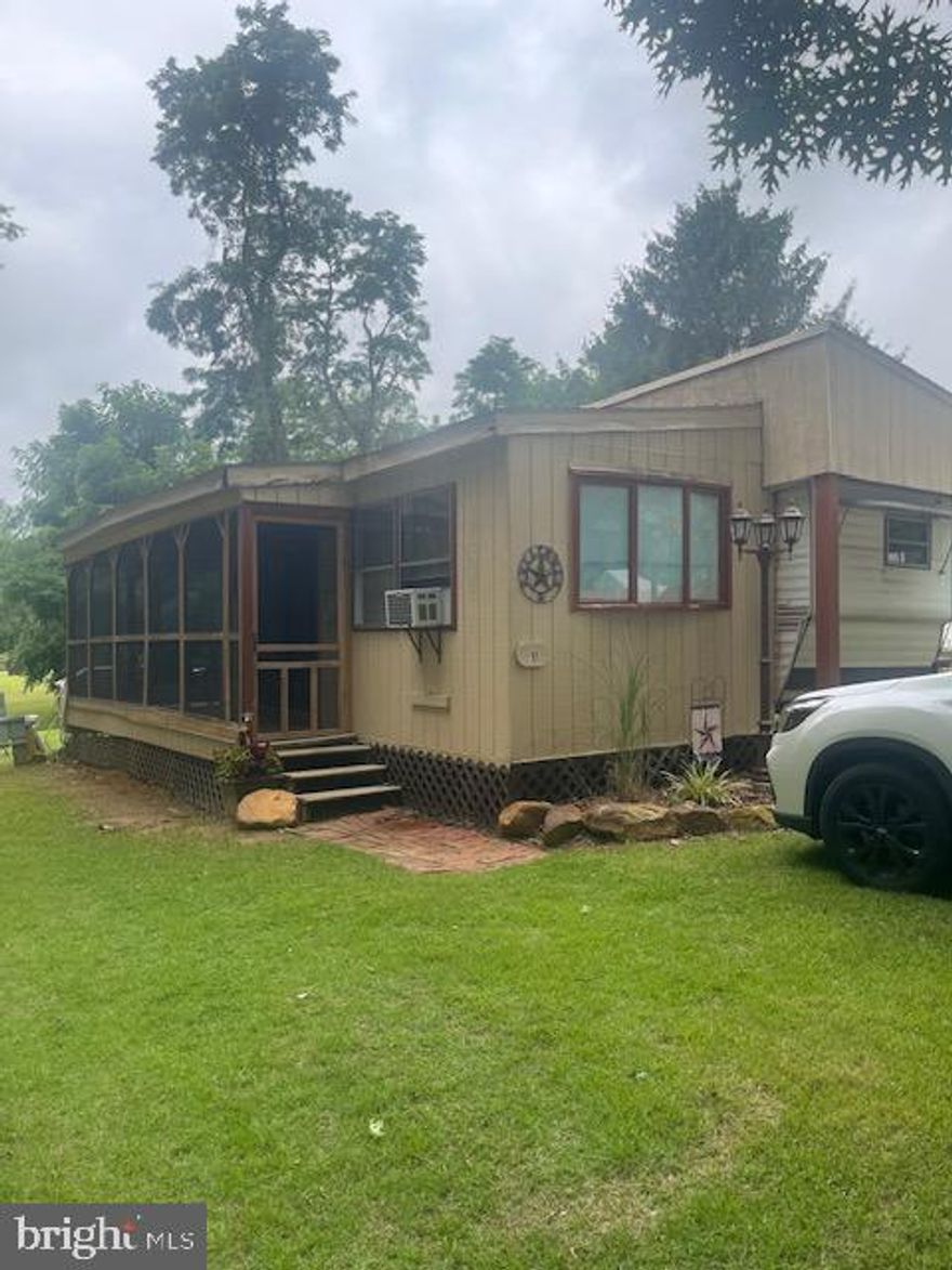 A great weekend/vacation destination you own in a gated community. Located in Indian Acres Campground which is deed restricted to 150 days a year no more than 100 consecutive days (not a full time residence). This property is a must see as the seller has made many upgrades and the place is so charming. Come enjoy the super size pool, a kiddy pool, boat ramp that leads to the Sassafras and onto the Chesapeake Bay, fishing ponds and lake to relax and enjoy nature. Still time to get in and enjoy the planned activities, convenience store, arcade, and so much more this community has to offer.