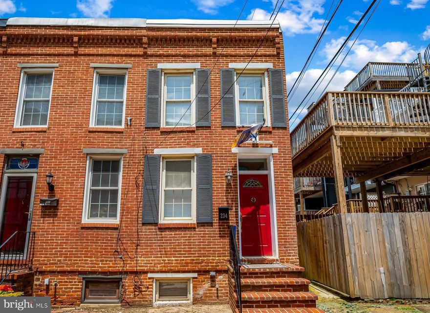 Open House on SUNDAY, 12-1PM. Beautifully Renovated Home Next to Riverside Park!  A charming brick-front home ideally located just steps from beloved Riverside Park. This thoughtfully renovated 2-bedroom residence features gleaming hardwood floors, a modern kitchen with 42" cabinets, granite countertops, and stainless steel appliances. The spa-like bathroom includes a luxurious soaking tub with jets, perfect for relaxing after a long day. Enjoy outdoor living on the private rear patio with a full privacy fence—ideal for entertaining or quiet mornings with coffee. With ample closet space and a prime location near Federal Hill restaurants, shops, and commuter routes, this home offers the perfect blend of style, comfort, and convenience.
