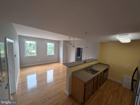 Photo of 400 Renfro Drive #206, GLEN BURNIE, MD 21060 (MLS # MDAA2129688)
