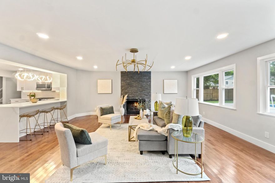 !!! RATES HAVE GONE UP! SELLER IS WILLING TO CONTRIBUTE UP 2% OF PURCHASE PRICE TO BUY DOWN BUYERS RATE! (2/1 BUY DOWN AVAILABLE  WITH OUR PREFERRED LENDER, KEVIN FERGUSON WITH FAIRWAY INDEPENDENT MORTGAGE) INQUIRE WITH LISTING AGENT FOR MORE INFO.. TASTEFULLY RENOVATED SPACIOUS SPLIT FOYER IN SOUGHT AFTER WILLIAMSBURG NORTH COMMUNITY! Main level greets with a welcoming sitting room adorned with handcrafted accent wall and upscale built in electric fireplace... fresh paint and recessed lighting throughout... gleaming newly refinished hardwoods lead to a grand eat in gourmet kitchen boasting quartz countertops, Samsung appliances, built-in wine refrigerator, abundance of cabinetry, and oversized island for additional storage and bar seating... Sizable living room beaming with bright natural light by day and ambiance courtesy of your cozy wood burning fireplace at night... Master featuring impressive ensuite with shower, freestanding soaking tub, and double vanity... Third and fourth bedroom on the upper level with full bathroom... Fully finished basement presents a fifth bedroom and third full modernized bathroom... New Roof... Fully fenced in backyard, screened in porch, and built in pool are ready to fulfill all your summer entertaining dreams! Just minutes to Old Town Alexandria, shopping, restaurants, and entertainment. Great commuter location with easy access to 95, 495, and GW Parkway. Walking distance to the Library, playground, soccer fields, and weekly local farmers market! This beauty is going to go fast, Schedule your showing today!