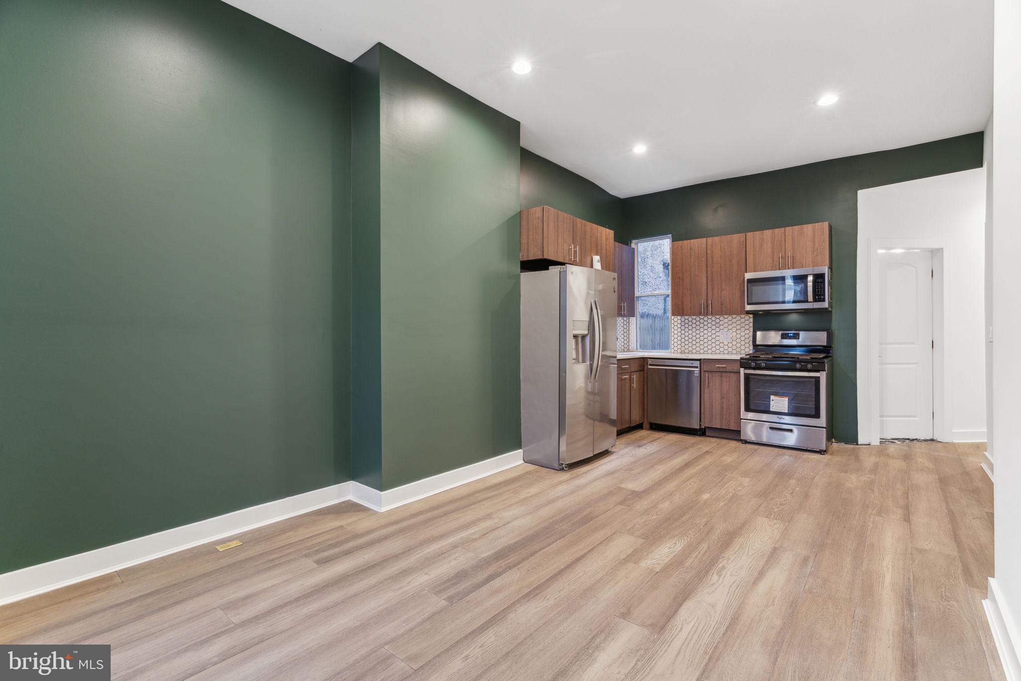 Are you looking for an incredible investment opportunity just blocks from Temple University? Welcome to 2146 N Van Pelt Street, an immaculate and tastefully renovated property completely redone from top to bottom. This multi family gem consists of two, 3 bedroom apartments, however there is a separate in law suite in the basement with a third kitchen and extra bathroom with a private walk out basement entrance as another income producer. Other thoughtful benefits of this investment property are 2 gas meters, 2 electric meters, 3 water heaters , two 200 amp electric panels, and multi zone hvac. The unit breakdown is as follows- Unit 1 is a 3 bedroom/1 bath apartment with a separate in law suite in the basement with private access to the rear yard. This apartment features 2 full bathrooms, and 2 brand new kitchens with stainless steel appliance packages, white Calcutta quartz countertops, modern wood grain cabinets, and a designer tiled backsplashes. Hardwood flooring throughout, central air, brand new windows, recessed lightning, 2 full bathrooms with gorgeous tile work, you name it! Unit 2 is located upstairs and features a spacious 3 bedroom/ 1 bathroom apartment with the same modern upgrades and finishes. This is a home run investment opportunity in a great location. Walking distance to Temple University, close public transportation, and is also accessible to many shops and restaurants including some new local hot spots in Brewerytown.