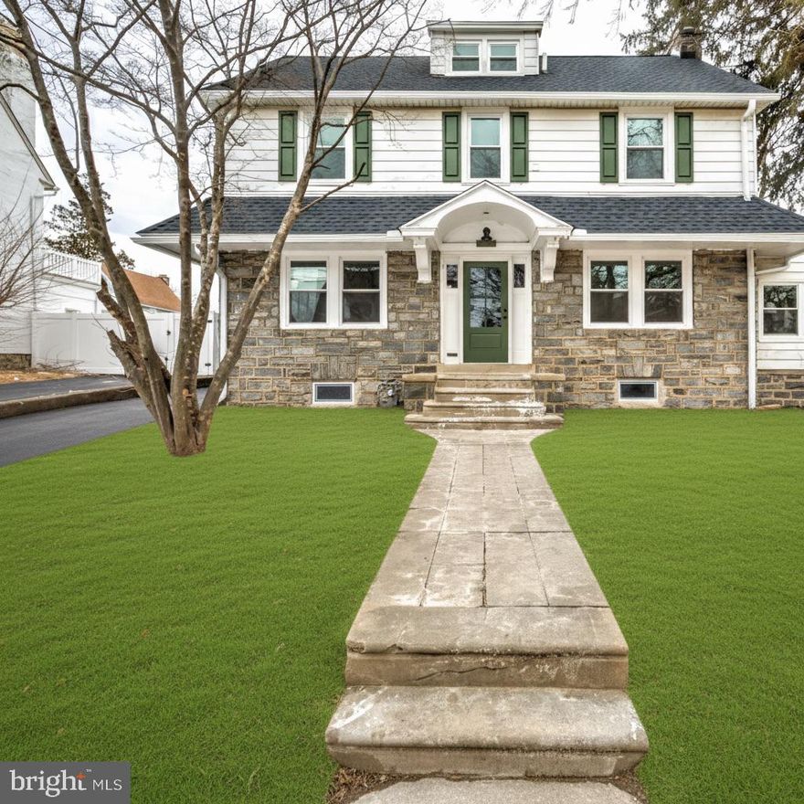 725 Turner Avenue is a completely and beautifully renovated 5 bedroom, 3.5 bathroom home with a detached two-car garage, set on a quiet residential street in the heart of Drexel Hill! Elevated traditional styling shines throughout, complemented by a rebuilt deck and a fenced, usable rear yard ideal for everyday living and entertaining. A classic entryway welcomes you with the original staircase, detailed millwork, and glowing refinished hardwood floors that continue across the main level. The large living room is anchored by a striking stone fireplace and custom built-ins, creating a warm and inviting focal point. A doorway leads to a spacious second room, perfect for a sunny den, office, or play space. Across the home, the dining area opens seamlessly to a show-stopping brand-new kitchen outfitted with warm natural wood-toned base cabinetry, contrasting white upper cabinets, quartz countertops, a tile backsplash and stainless steel appliances. A large center island offers generous workspace and casual dining options. A convenient first-floor powder room and dedicated laundry room complete the main level. Upstairs, the elegant second floor features three lovely bedrooms, including an enviable primary suite. An inviting bedroom gives way to a stunning, private ensuite bath showcasing a double vanity, tiled walk-in shower, and relaxing soaker tub. A second full bathroom serves the remaining bedrooms on this level. The third floor adds two additional cozy bedrooms with distinctive arched ceiling architecture and a third full bathroom. A clean, unfinished basement offers excellent practical storage. Also enjoy complete peace of mind due to the brand new architectural shingle roof, new efficient gas HVAC system, and replacement windows throughout!!! This home has it all - thoughtful renovation, timeless design, and prime Drexel Hill location. Schedule a tour today! 
Please Note - Exterior paint on the rear of the home is still outstanding and will be completed as dryer weather conditions allow.