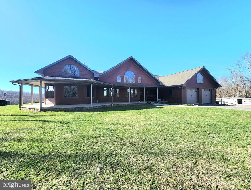 Get ready to be Wowed! This custom built home sits on 14.12 acres at the top of The Summit of Harwood.  No details were overlooked when designing this home. If you are looking for one-level living, look no further. Home offers 4 bedrooms and 3 full baths. There is a custom kitchen, open floor plan living room and dining room with 16+ foot tounge and groove, white wash pine Cathedral ceilings. You can enjoy your custum gas fireplace and stay warm and cozy with the radiant heating. Off the living room you will find an adjoining family room space with access to the wrap around porch. Primary bedroom is off the living area and offers walk-in closet with custom build ins and an ensuite bath with jetted tub, separate shower and vanity. The other 3 bedrooms are on the other side of the living area, and all are attached to a full bathroom. Outside you  will find a wrap-around porch where you can sit and take in the panoramic views from the back of the property. Don't miss your opportunity to own this fantastic property.