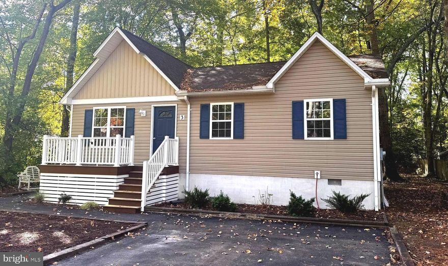 ATTENTION ALL BUYERS:  Don't miss out on the opportunity to own a coastal cottage at the beach!!   Be sure to make your appt today to view this charming  3 BR/ 2 BA property at 3 Nottingham Lane... now fully updated and just waiting for you!   All new kitchen with beautiful granite counters, stainless appliances, mission style cabinetry.    Freshly painted, new ceiling fans, all new lighting, fixtures  and new lvp luxury flooring and new ceiling fans,   LVP in main living spaces and new carpet in Bedrooms.   Brand new Bosch HVAC system and newer roof!   Improvements  in each Bathroom too!!   Screened porch has new screening and fresh paint/outdoor carpet  with storage underneath for added convenience!  Enjoy the fresh look with the board batton siding on front gable.  Updated  with no maintenance vinyl railings on front deck too!!  No worries for you... with an encapsulated crawl space  as well and Paved Driveway!
Live your best life in Ocean Pines... enjoy the use of 5 pools (with membership),  One of these pools is in Ocean City... with parking too!!   Have fun playing tennis, pickleball, basketball, walking paths, running trails , crabbing, fishing -- all of the things outdoors!!  Boat ramps nearby near the Marina at the Yacht Club and one at Pines Point!!