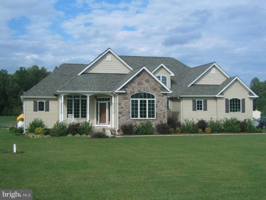 Fabulous Rambler in a Water Access neighborhood! This 4 bedroom 3 bath home has a split floor plan with a bonus room over the garage and a finished rec room in the basement. Kitchen features corian counters, gas cook top and wall oven. Additional features include gas fireplace, large 2 car garage, attic storage, screened porch , deck and patio. Roof replaced  November 2019