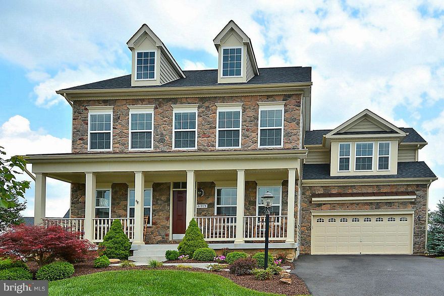 BEAUTIFUL HOME THAT IS IMMACULATE! GREAT LOCATION! HIGHLY SOUGHT AFTER EVERGREEN VILLAGE COMMUNITY! LARGE FENCED IN LOT, FULLY FINISHED WALK OUT BASEMENT. MANY UPGRADES THROUGH-OUT HOME, GOURMET KITCHEN WITH EXPANDED CABINET AREA, GRANITE, STAINLESS APPLIANCES, HARDWOOD FLRS ON MAIN, LARGE MASTER, UPGRADED BATHRM TILES, WALKIN CLOSETS IN ALL BDRMS, TREX DECK, OFFICE ON MAIN FLR. SEE VIRTUAL TOURS