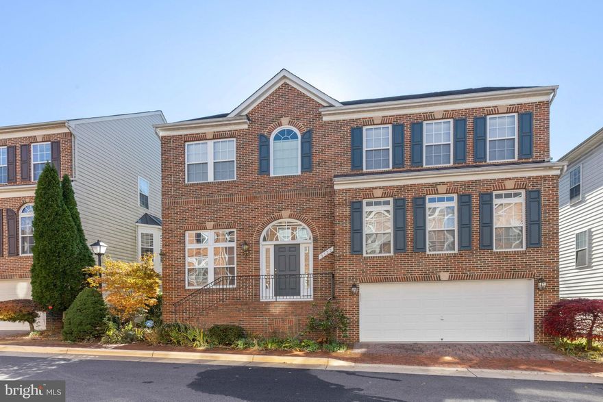 Dramatic two story foyer entrance opens to a modern floor plan.  Must see 3D Virtual Tour! Large, spacious rooms with 9' ceilings.  Brick Front.  Gourmet Kitchen w/ Corian Counters, double stainless steel oven, two story stone fireplace in large family room.  Walk out to deck.  Separate Living and Dining Rooms. Crown moldings/Chair Railing/Trey Ceilings.  Transom windows.  Recessed lighting.  Large Master Suite with trey ceiling and spacious walk in closets.  Luxury bathroom with double sinks, jacuzzi tub, separate shower.  4 total spacious bedrooms up.  Upper level laundry. Lower level Den could be used as a 5th bedroom with lower full bath.  Recreation room with walk out stairs. Lots of basement storage in large storage room.  Great community with community pool, tot lot.  Off-base in Ft. Belvoir.  Very convenient to Belvoir gates, Quantico and DC.  Close to Wegmans and other shopping in Alexandria and Lorton area shopping.  Lorton VRE also close.  Easy access to I-95.