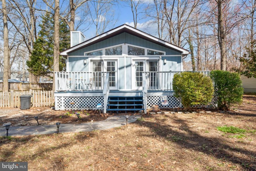 Welcome to this absolutely charming ranch-style home located in the highly desirable, water-privileged community of Avalon Shores. This contemporary cottage offers a cozy and inviting atmosphere, highlighted by a warm wood-burning fireplace and an open floorplan that enhances the space with cathedral ceilings, creating a bright and airy living environment.

The well-sized owner’s bedroom boasts direct access to the expansive wraparound deck, perfect for enjoying the outdoors. The property is situated on a generous lot, complete with a shed for additional storage.  Recent updates include new carpeting for a fresh look and water conditioning equipment for added convenience and peace of mind.

Residents of Avalon Shores enjoy exclusive access to a range of community amenities, including a swimming platform, picnic tables, playground, boat ramp, and a fishing/community pier. The common areas are thoughtfully maintained through taxes, ensuring a well-kept environment.

This home is an ideal blend of comfort and functionality, offering a perfect opportunity to embrace a tranquil lifestyle in a vibrant waterfront community.