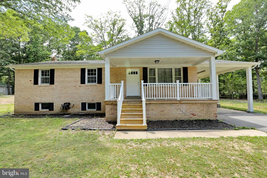 Welcome to your dream home! Nestled on just over an acre of land, this exquisite Raised Rancher offers a spacious and comfortable living experience. With a total of 5 bedrooms, this home provides ample space for you and your guests.  As you step inside, you'll be greeted by the warmth and elegance of hardwood floors on the main level, creating a welcoming atmosphere throughout. The kitchen boasts modern stainless steel appliances and upgraded cabinets, adding a touch of sophistication and ensuring a delightful culinary experience.  In the basement, you'll discover a remarkable entertainment space featuring a s 3D projector and screen. Imagine cozy movie nights with loved ones or cheering on your favorite sports team in this immersive home theater setting.  The basement also features luxury vinyl plank (LVP) flooring, which combines durability and style, adding a contemporary touch to the space. This versatile area can be transformed into a home gym, playroom, or any other space that suits your lifestyle.  With carpeted flooring in all the bedrooms, you'll experience comfort and warmth as you retreat to your private haven. The generous number of bedrooms ensures ample space for relaxation and personalization, accommodating family members and guests alike.
The septic system was replaced last year, the roof is just 2 years old.  For those with multiple vehicles or a need for extra storage, the oversized 2-car garage, measuring 20X30, provides ample space for parking, workshop areas, or additional storage solutions.  Located in an area eligible for USDA financing, this home offers a fantastic opportunity for qualified buyers.   With its stunning features, spacious layout, and desirable location in White Plains, Maryland, this Raised Rancher presents an idyllic retreat for those seeking a perfect blend of comfort, style, and functionality. Don't miss your chance to call this beautiful property your home.