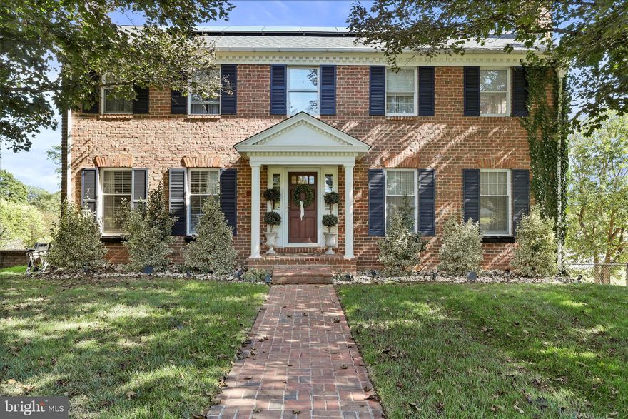 Fall in love with Martinsburg's own "Home Alone" House! All-brick Colonial in the sought-after Rosemont District on 0.55 acres. New roof (2025) on both the home and garage! Versatile layout offers up to 5 bedrooms w/ 3.5 baths on 3 finished levels. The main level boasts two separate wood burning fireplaces, two dining room options, an office, and separate laundry room (with chute.) The kitchen is every chef's dream with an island, marble countertops, custom cabinets, stainless steel appliances, and gas range with custom hood. The primary suite offers a  walk-in shower, separate vanity, and cedar closet. Upper bedrooms contain  automatic closet lighting. The lower level has been professionally designed to entertain! It features an 11.2 built in surround sound system, hard plumbed gas fireplace, bar area with water hookup, and custom mantle & wall made of  2oo- year old, naturally stained White Oak hardwood and full bath with floor to ceiling tile and rain shower.  The lower level also opens to a private,  in-ground pool with newer liner and new pump!
In addition, the home also offers a rebuilt  electrical panel with surge protection (2025), solar panels on the home & garage (2025), and a tankless hot water heater (2020). Attached garage (currently home gym) is accessible from inside the home! Let your imagination run wild with the detached garage! This semi- finished space currently serves as an office, but is ready for the kitchenette and full bath to be completed to make it perfect for a rental, or in-law suite!  Fenced rear yard. Convenient to shopping, dining, and MARC Train.