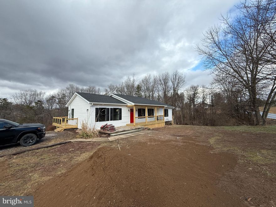 Professional photography Expected to be uploaded on 12/31/2025.

Completely renovated 3-bedroom, 2-bath rancher on 2.35 acres, with a full unfinished basement. This home has been updated from top to bottom with new electric, plumbing, and HVAC, offering peace of mind for years to come. The unfinished basement provides excellent storage or future living space potential. Conveniently located along Route 9, just 10 minutes from downtown Berkeley Springs and an ideal location for commuters. Enjoy easy access while still having plenty of space to spread out—perfect for full-time living or a low-maintenance getaway.
