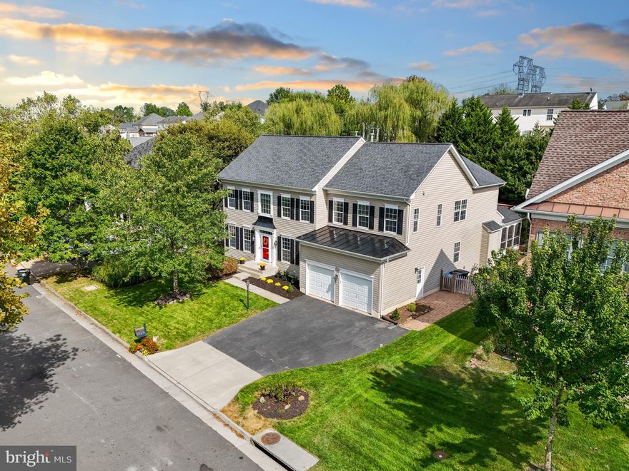 Welcome to this stunning Brookfield  Canterbury Model  5-bedroom, 4.5-bath home in the Braemar neighborhood!  Nestled on a private pipe stem, this home features Brazilian Koa hardwood floors throughout the first level, fresh paint, and new carpet. Thoughtfully designed spaces include a first-level home office, mudroom, butler's pantry, dedicated gym, and a garage extension for extra storage. Enjoy a large screened-in porch overlooking a beautifully landscaped yard with extensive hardscaping and a full sprinkler system.  Located in the Braemar community, residents enjoy two pools, multiple parks and playgrounds, walking trails, tennis and basketball courts, and a clubhouse with year-round events. Wonderful neighborhood, close to shopping, easy access to major roads. A perfect blend of comfort and convenience! New backsplash and countertops 2024, Roof replaced June 2018, New appliances 2024, Hall full bath upstairs remodel 2021, New air conditioner units (dual zone) Oct 2022