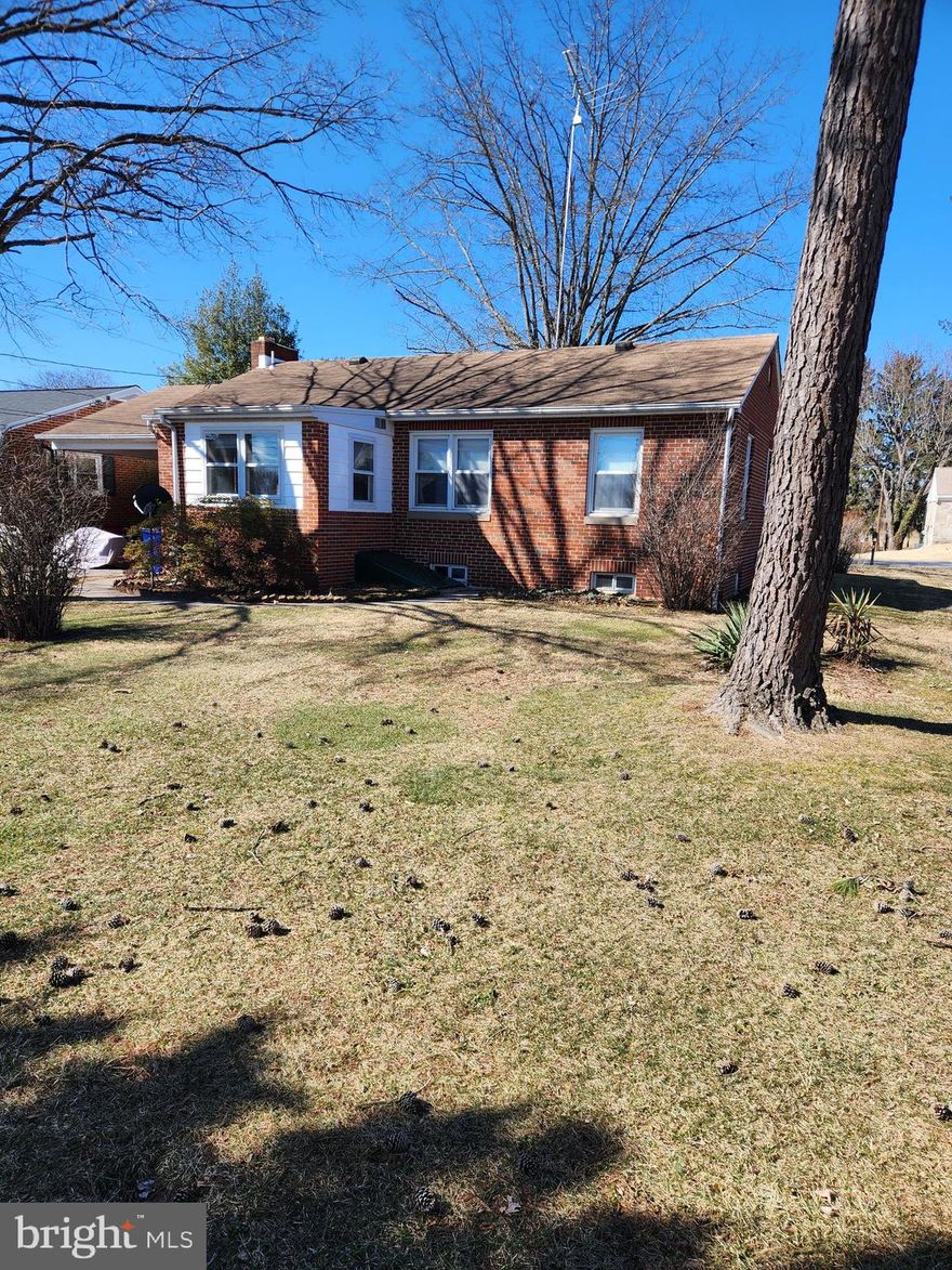 Estate sale being sold as-is... brick rancher with attached carport and nice yard in a small neighborhood. 3 br 1.5 bath , with hardwood under carpet that look good. the bath room tub was cut in the center to allow easy entry for elderly owner. the kitchen has not been updated in many years, but is very functionable. a little fixing up will go a long way. the lower level has a partial finished area, the rest is open and large, french drain was added several years ago, with 2 sump pumps. walk up bilco doors.